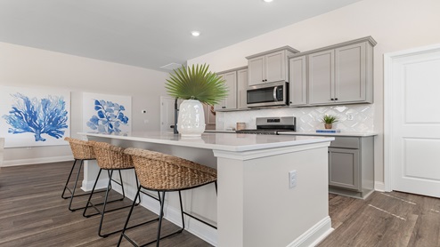 Eaton Kitchen with shaker-style cabinetry and a floating island