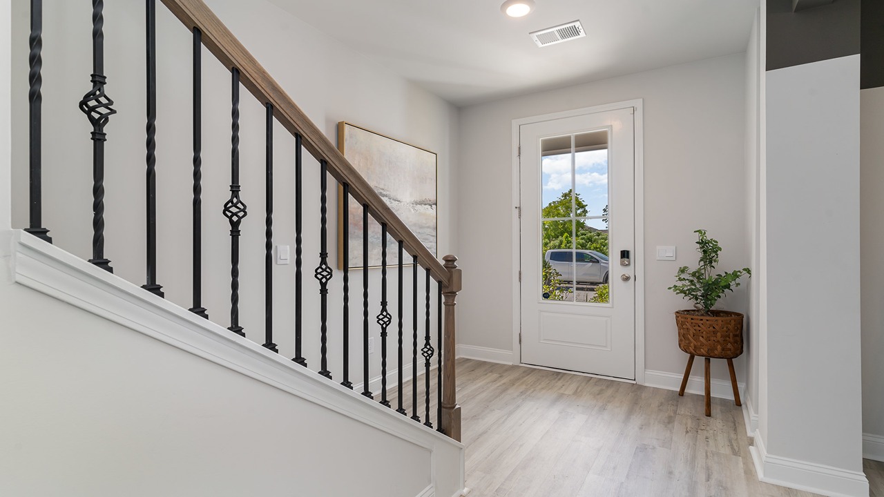 Front entrance and stairway to upstairs
