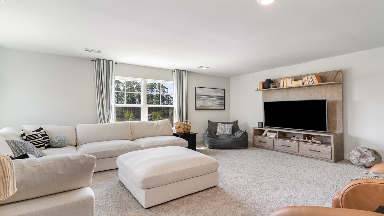 Functional loft staged as secondary living space upstairs