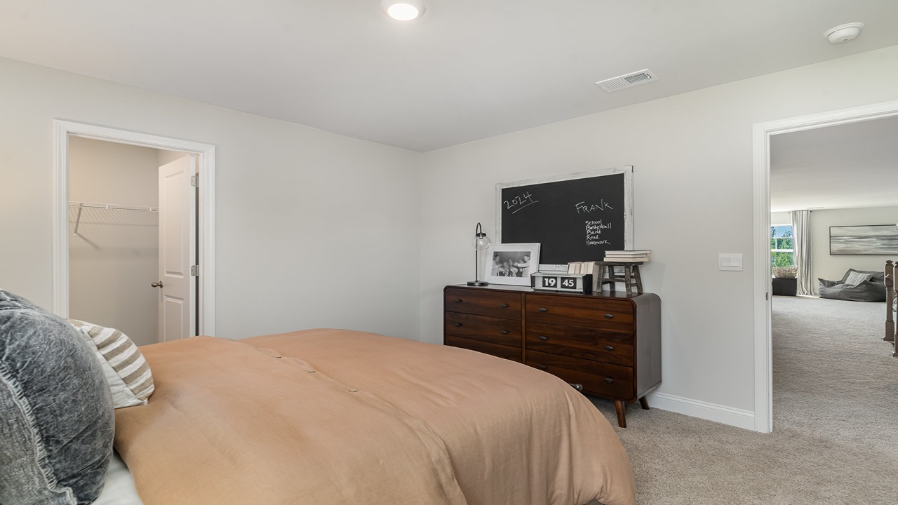 Bedroom 4 features a walk-in closet