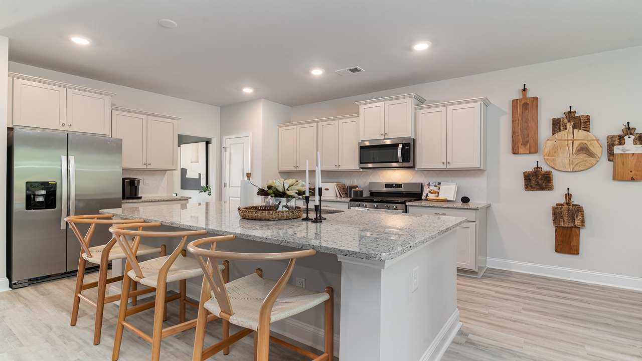 Floating island in Tillman kitchen with barstool seating