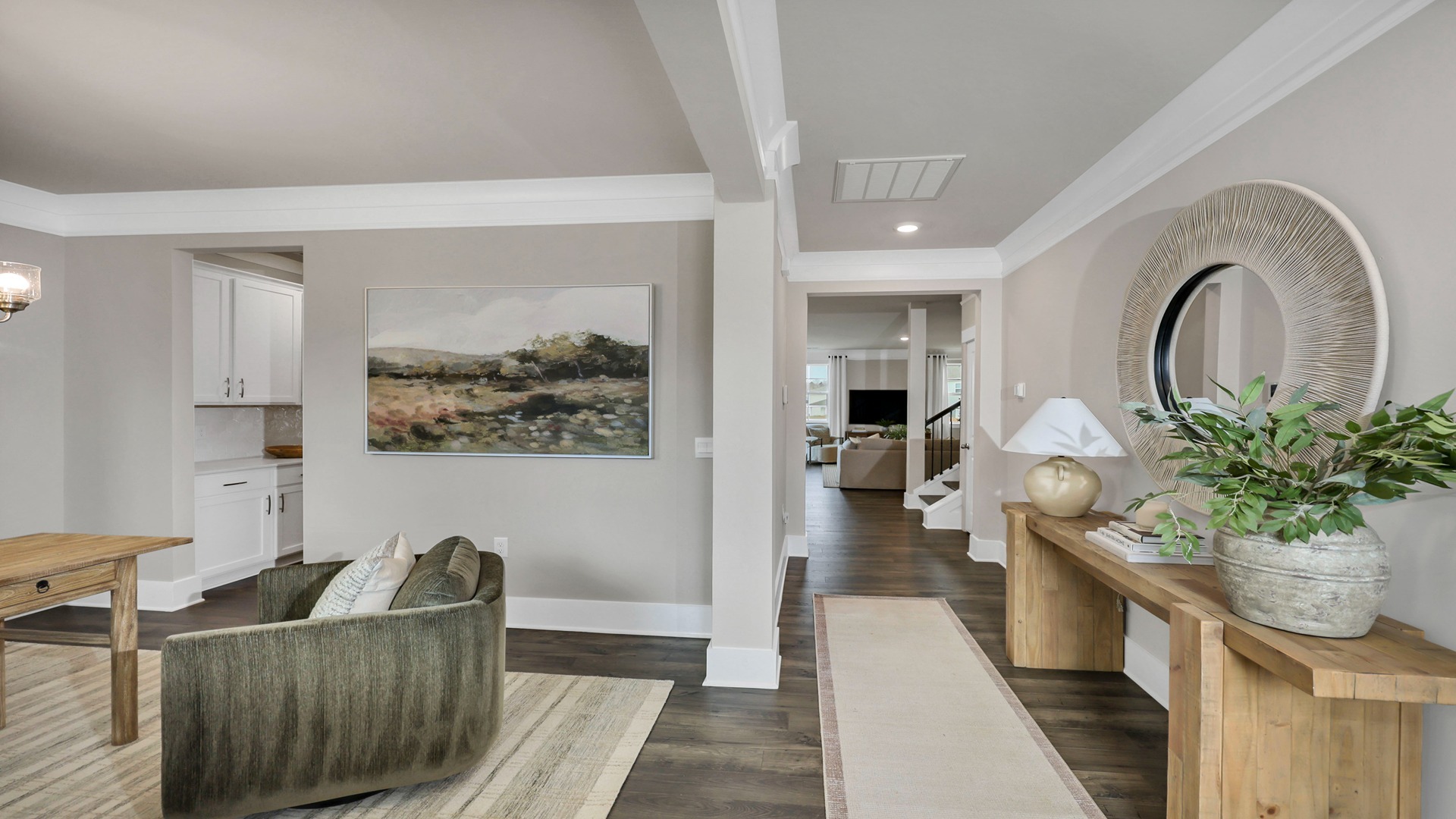 Front foyer leads from entrance and flex space into main living areas