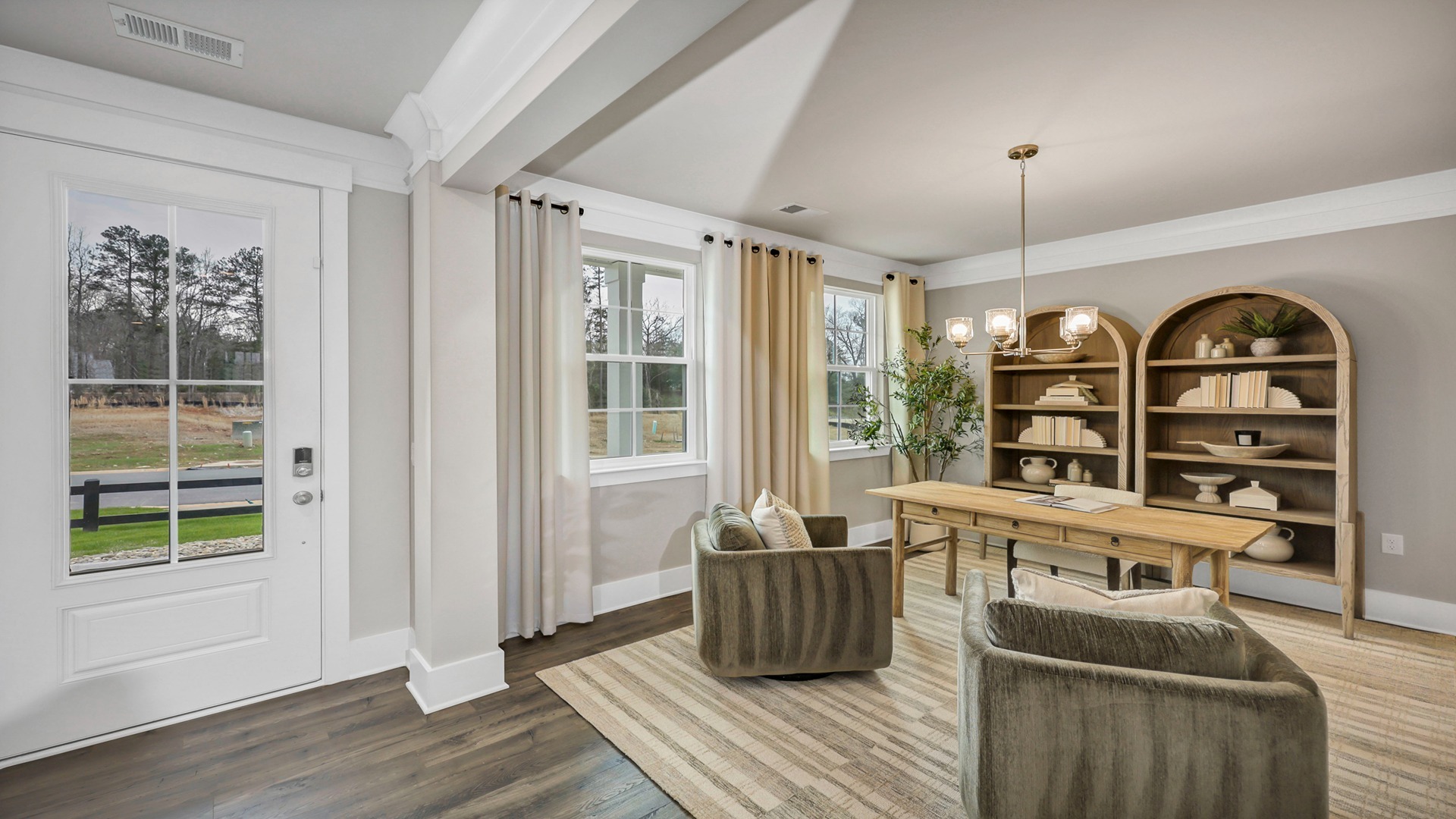 Front door and front flex space in the Harbor Oak