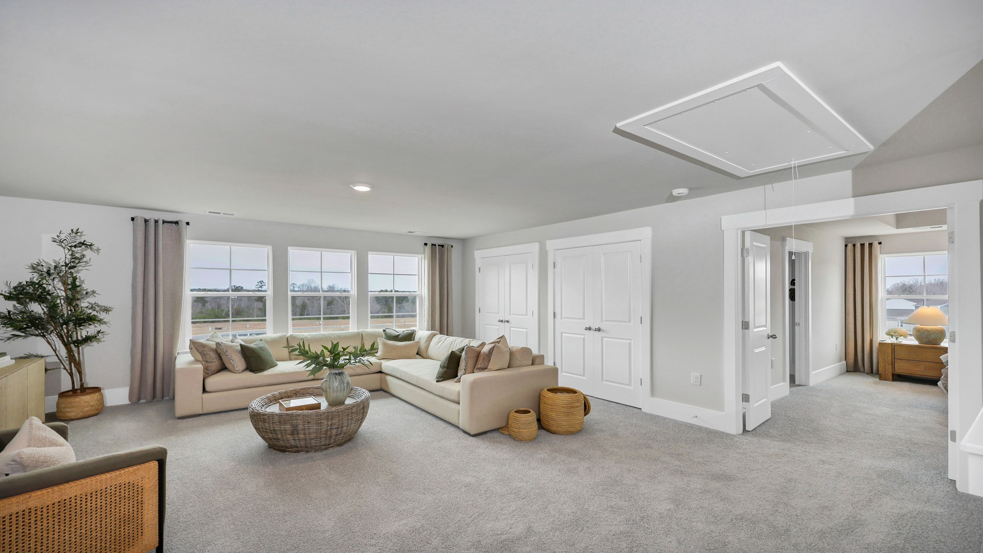 Upstairs living area at the top of the stairs