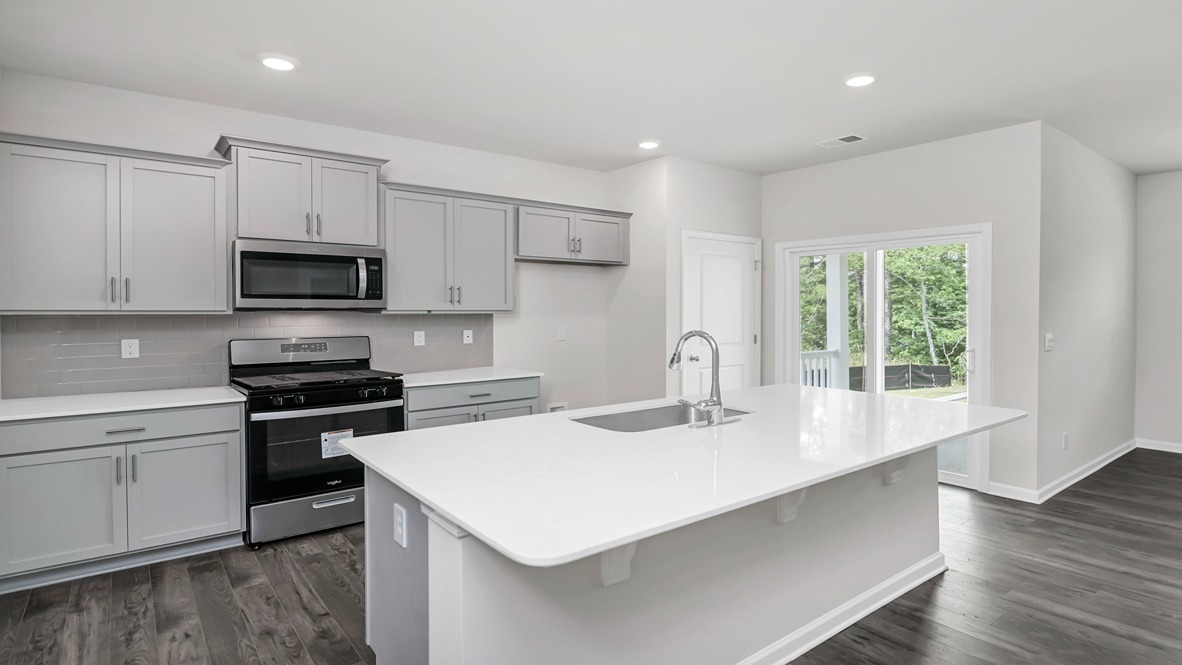 Kerry Kitchen with gray cabinetry and white quartz countertops