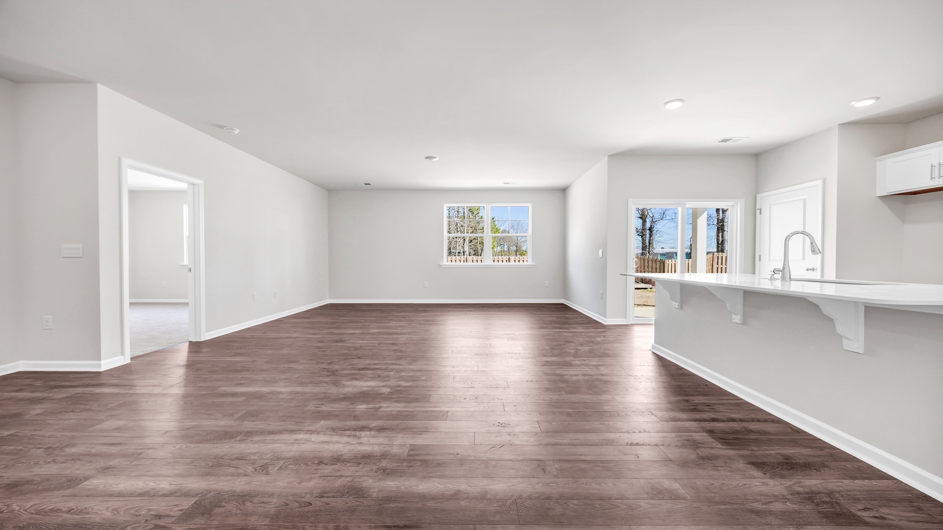 Kitchen, dining, and living areas are open concept