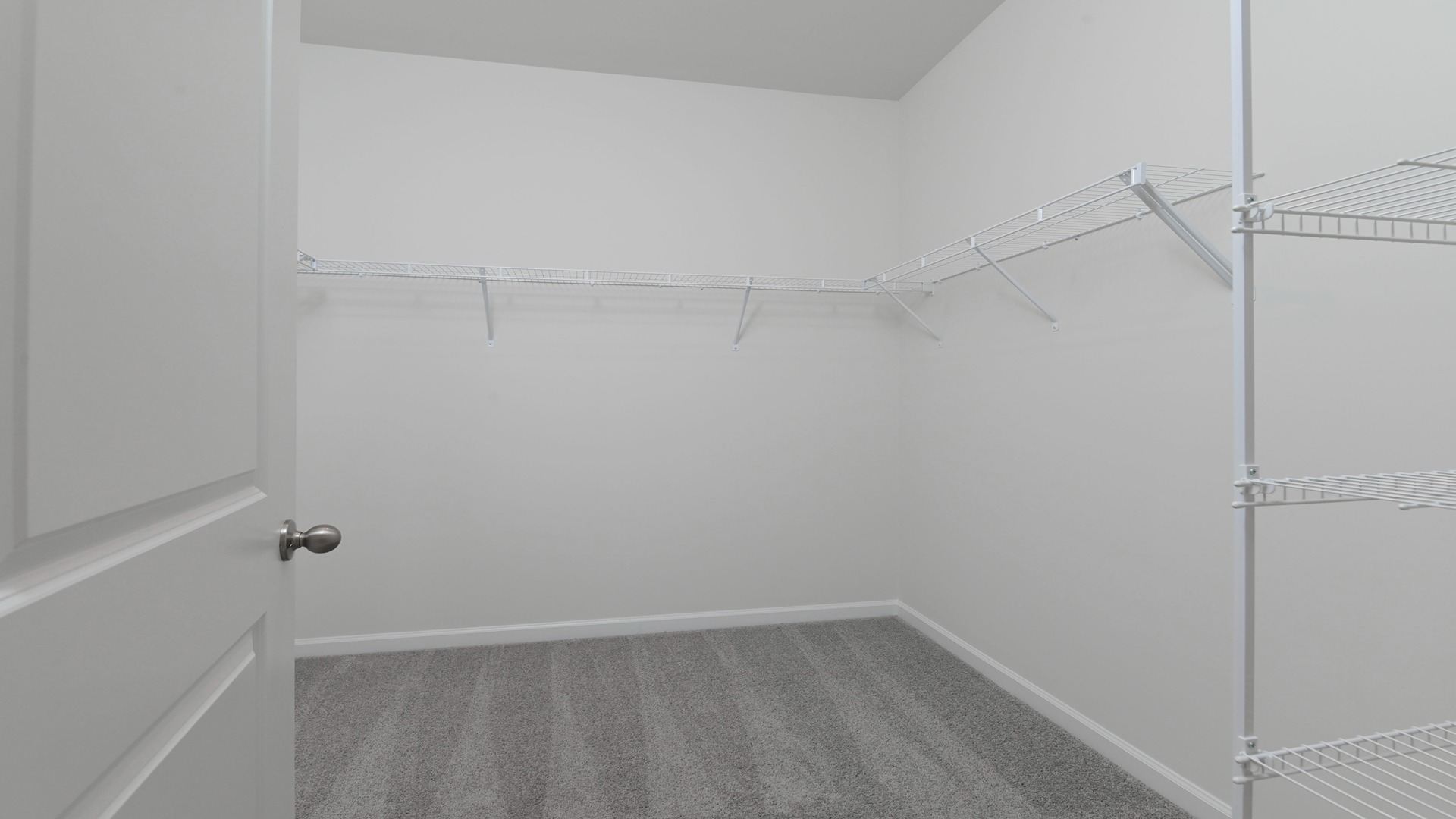 En-suite primary walk-in closet