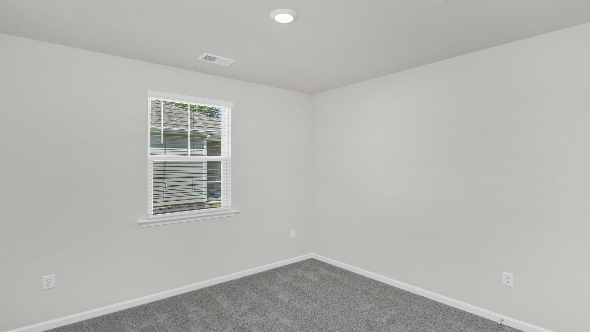 Bedroom 3 with carpet flooring