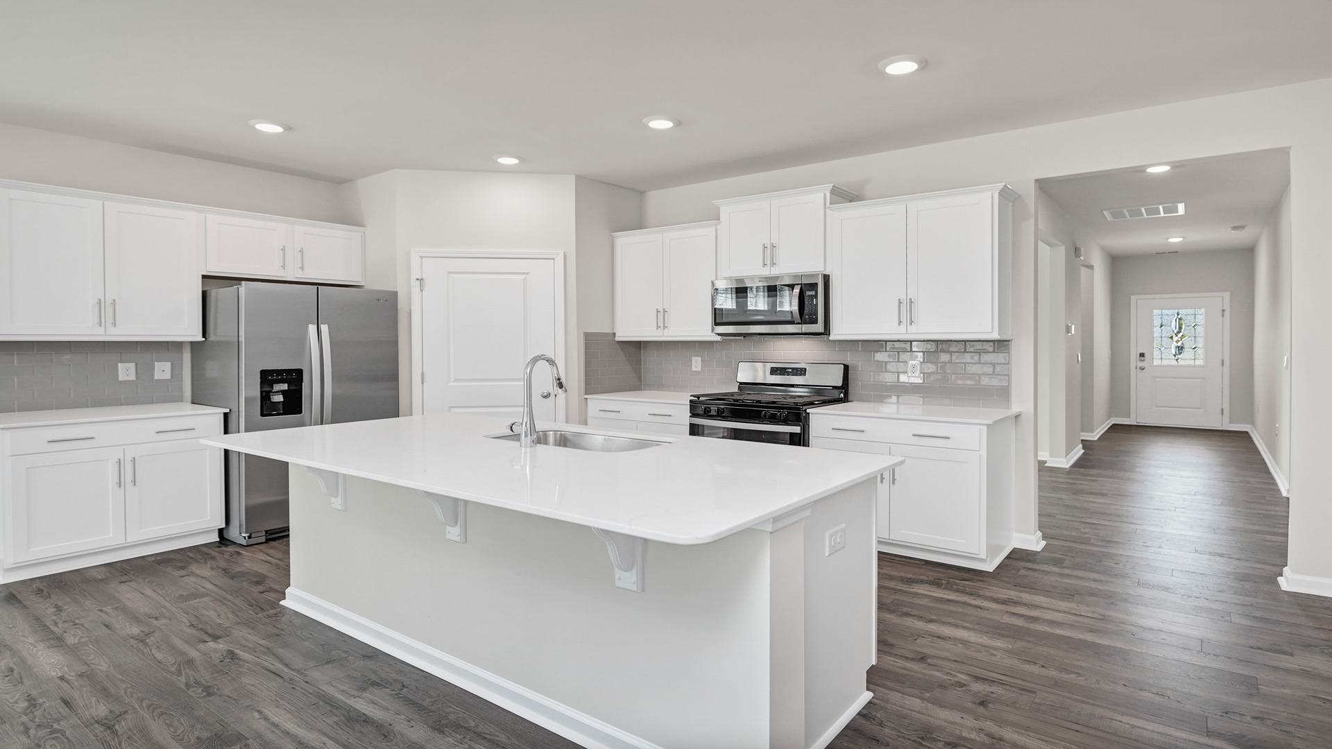Front foyer opens up into kitchen space