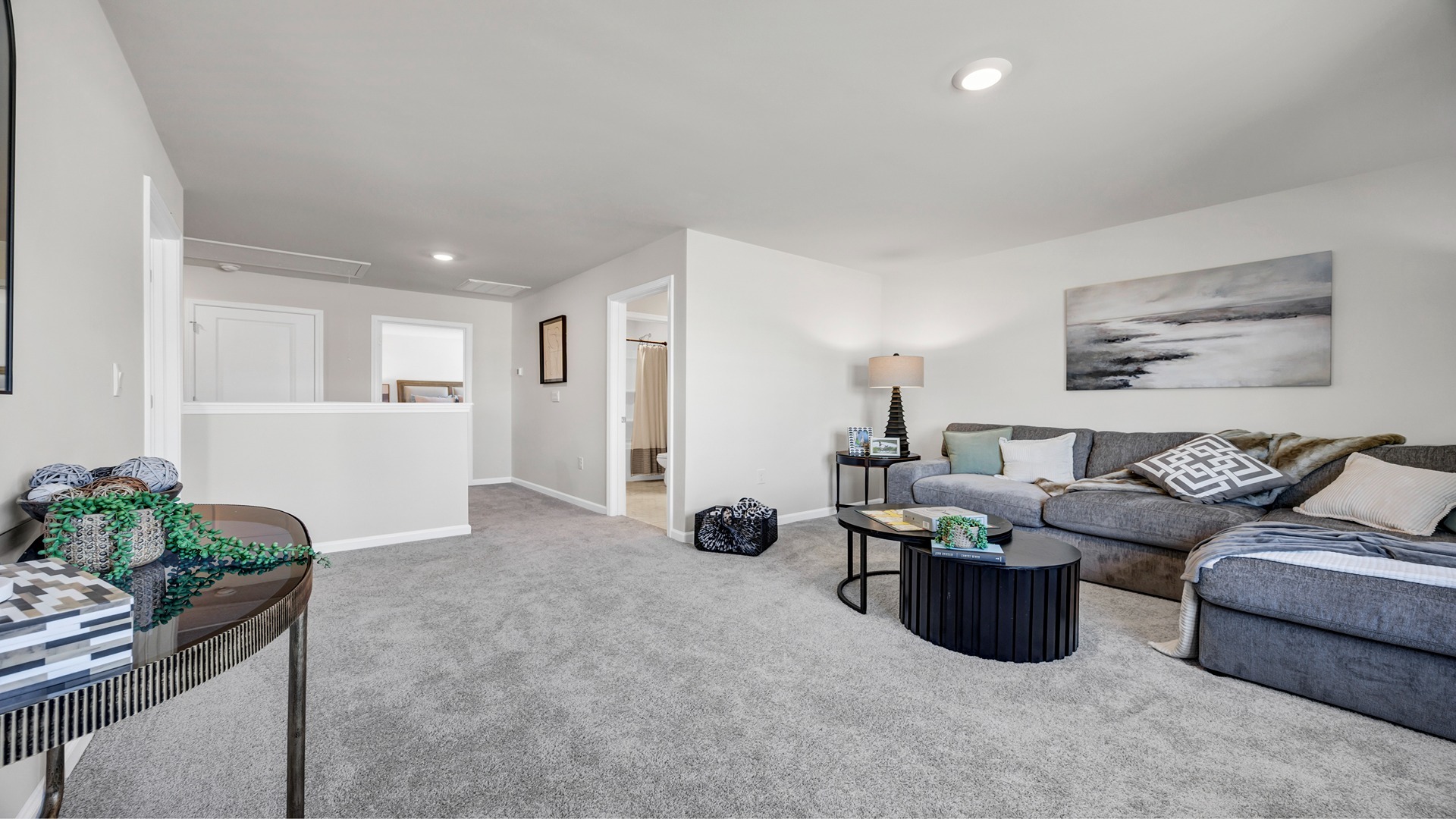 Upstairs loft space staged as secondary living area