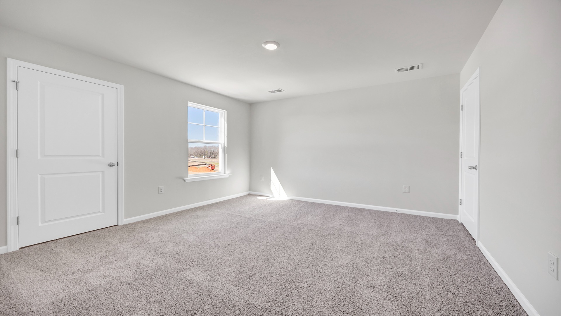 Upstairs bedroom 2 is carpeted.