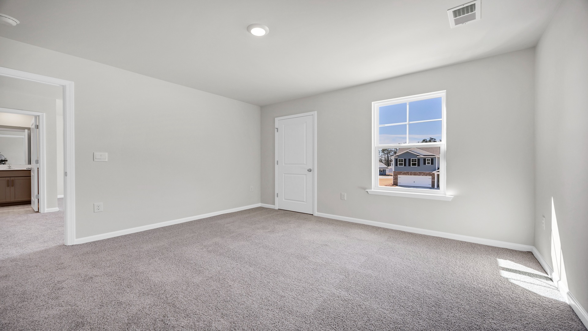 Upstairs bedroom 2 is carpeted.