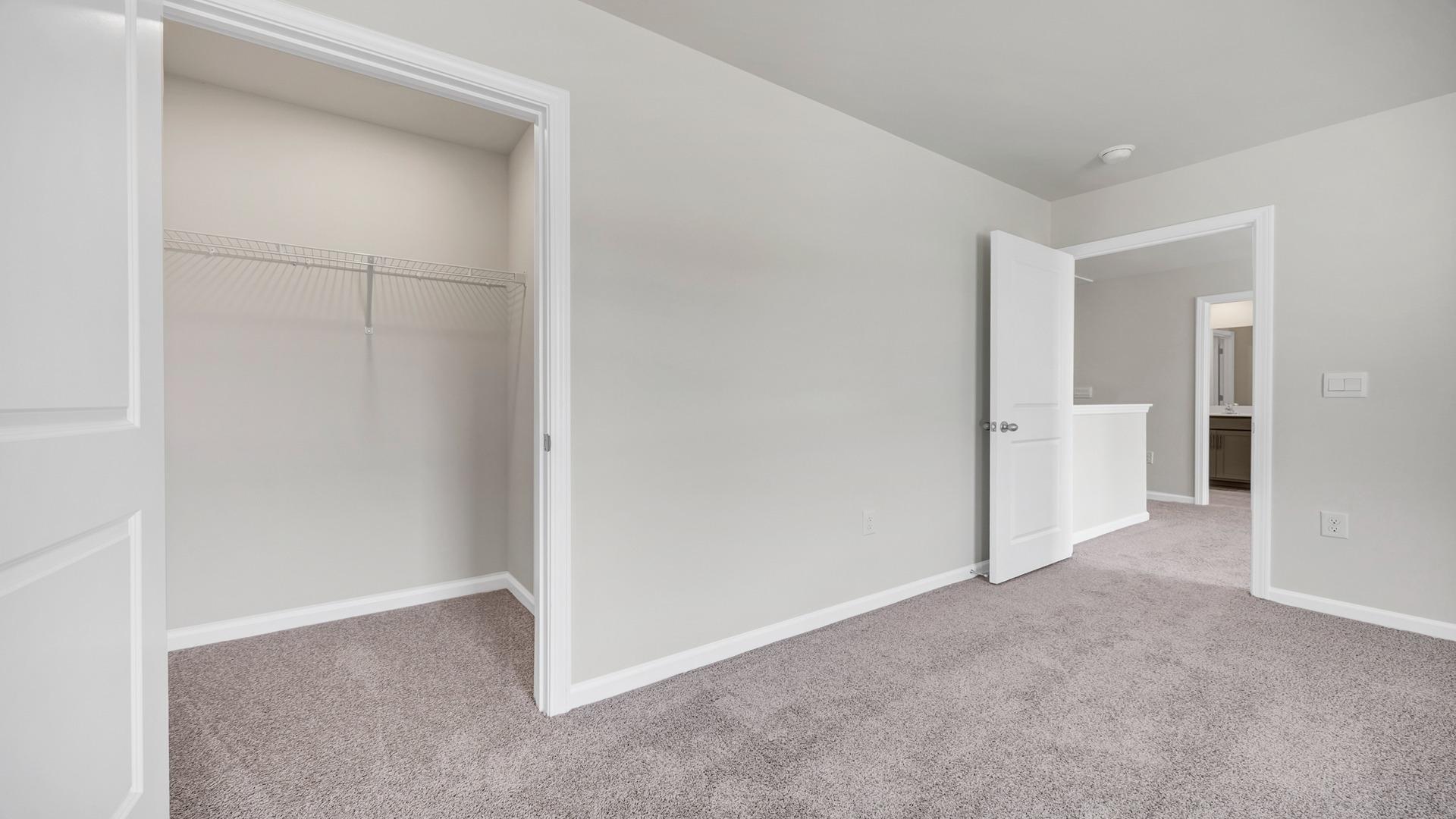 Upstairs bedroom 2 is carpeted.