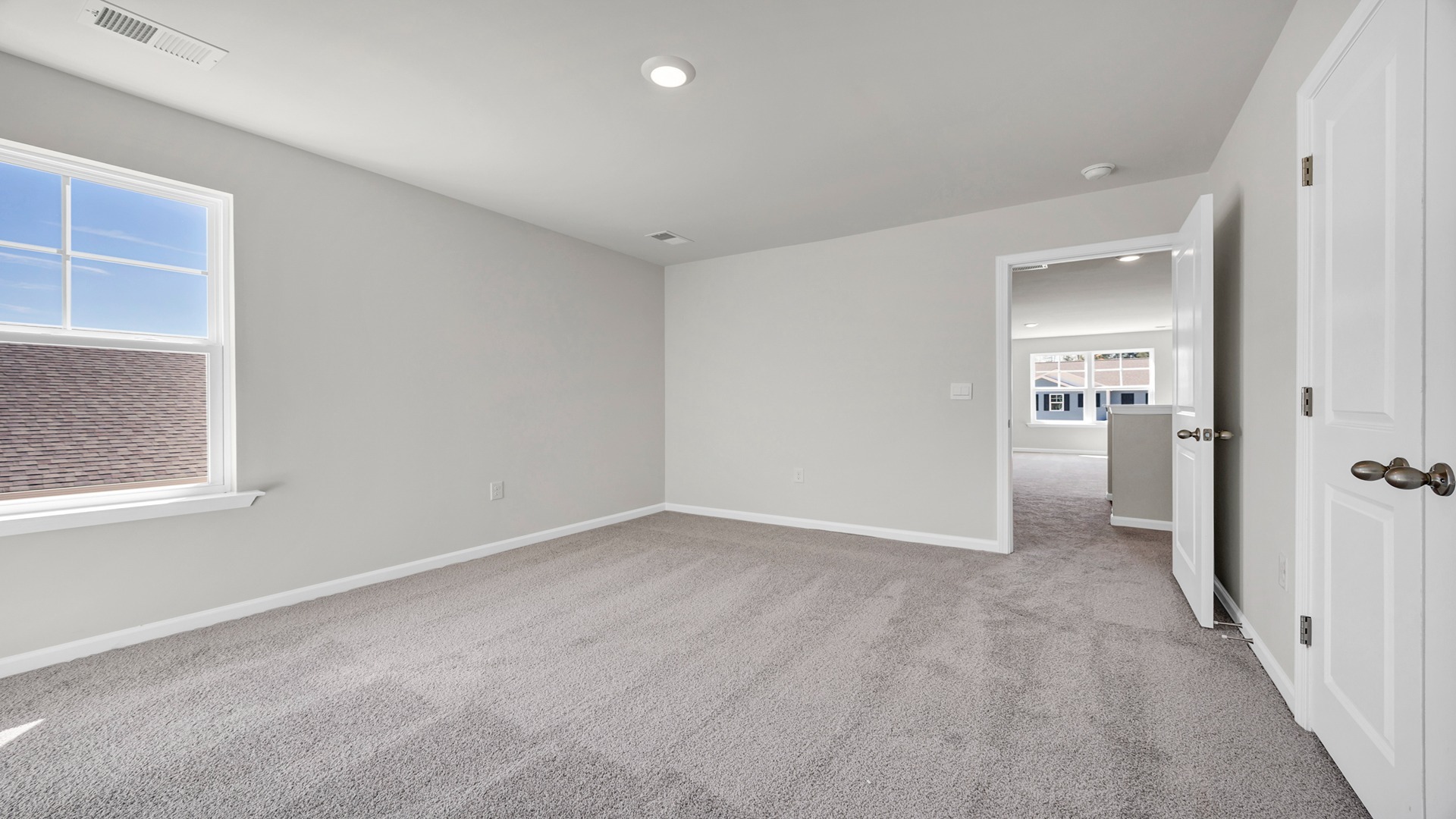 Bedroom 4 is carpeted and located upstairs.