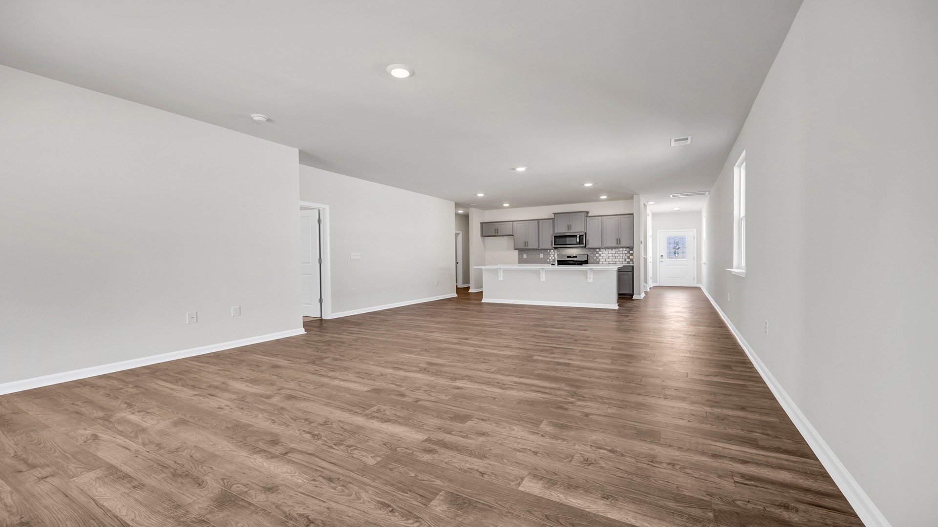 There is room for barstool seating at the floating kitchen island.