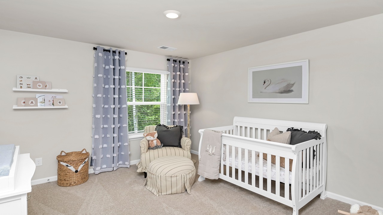 Bedroom 5 upstairs staged as a home nursery