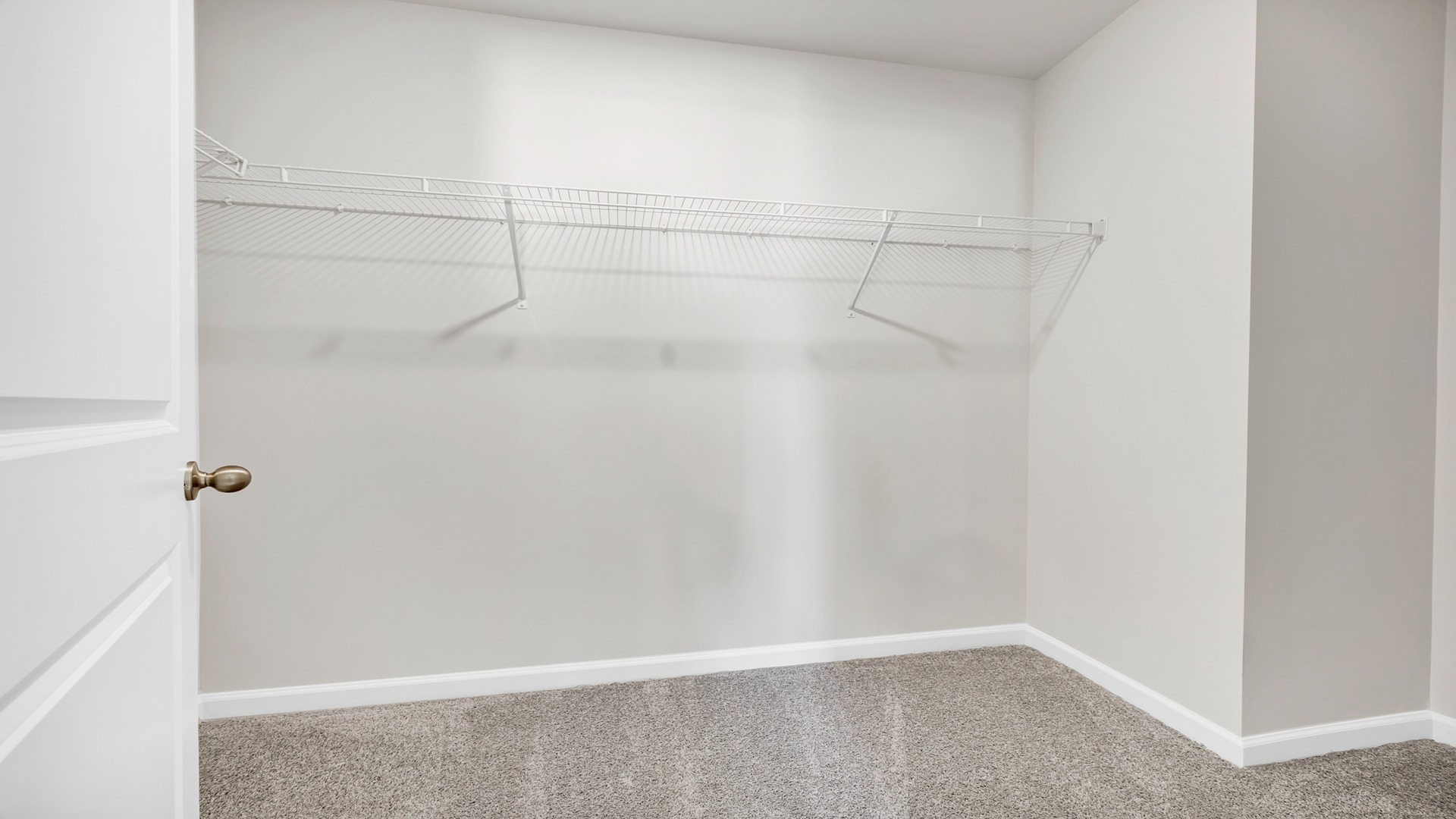 Spacious walk-in primary closet