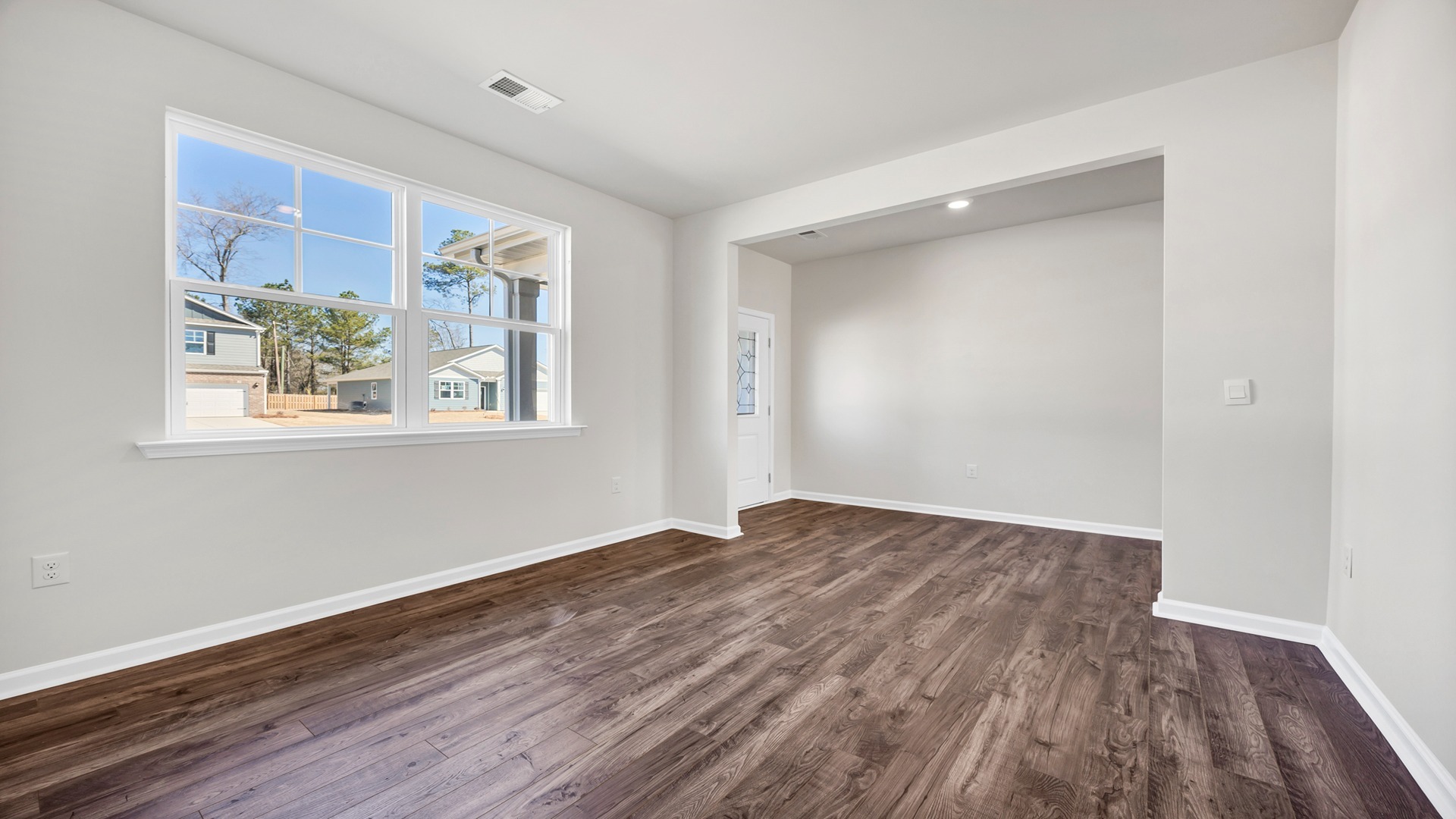 First-floor flex space with windows for natural light.