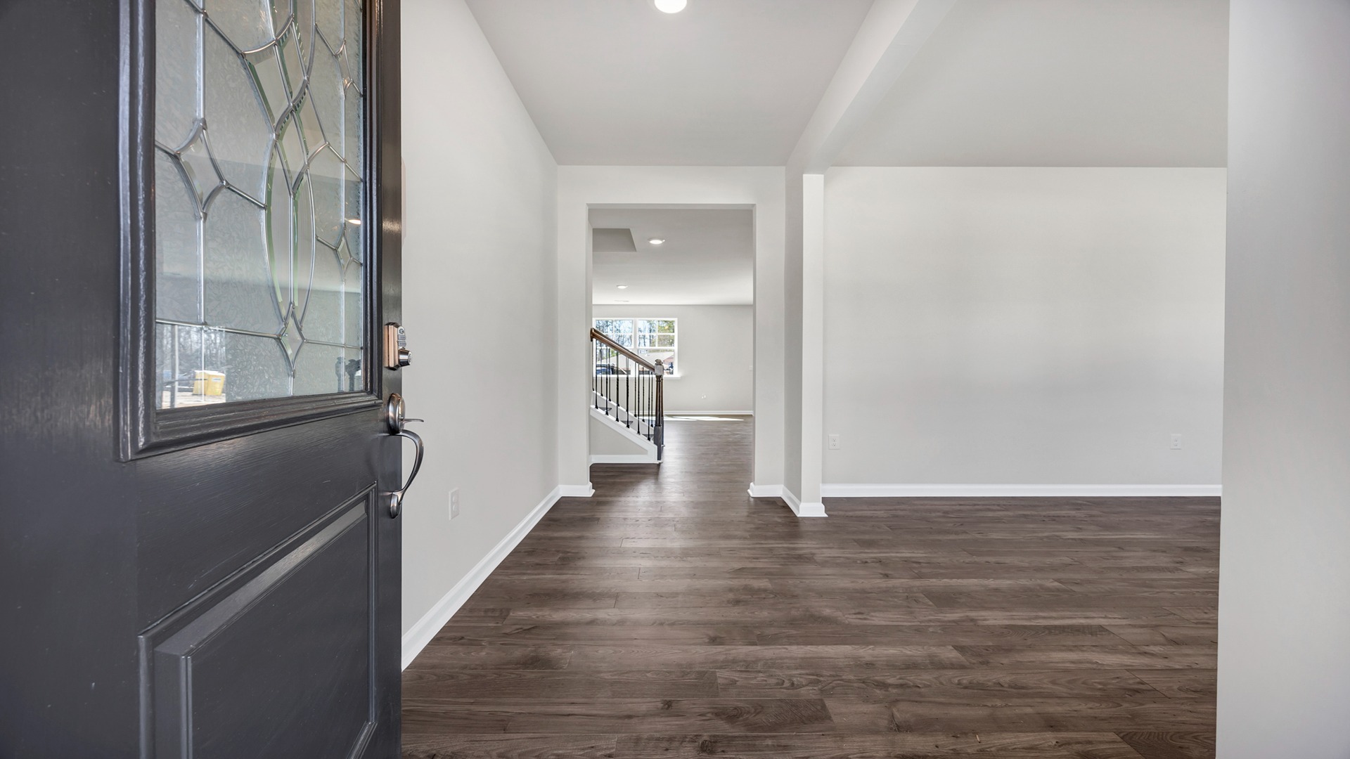 Entry way leading to first-flex room and living areas.