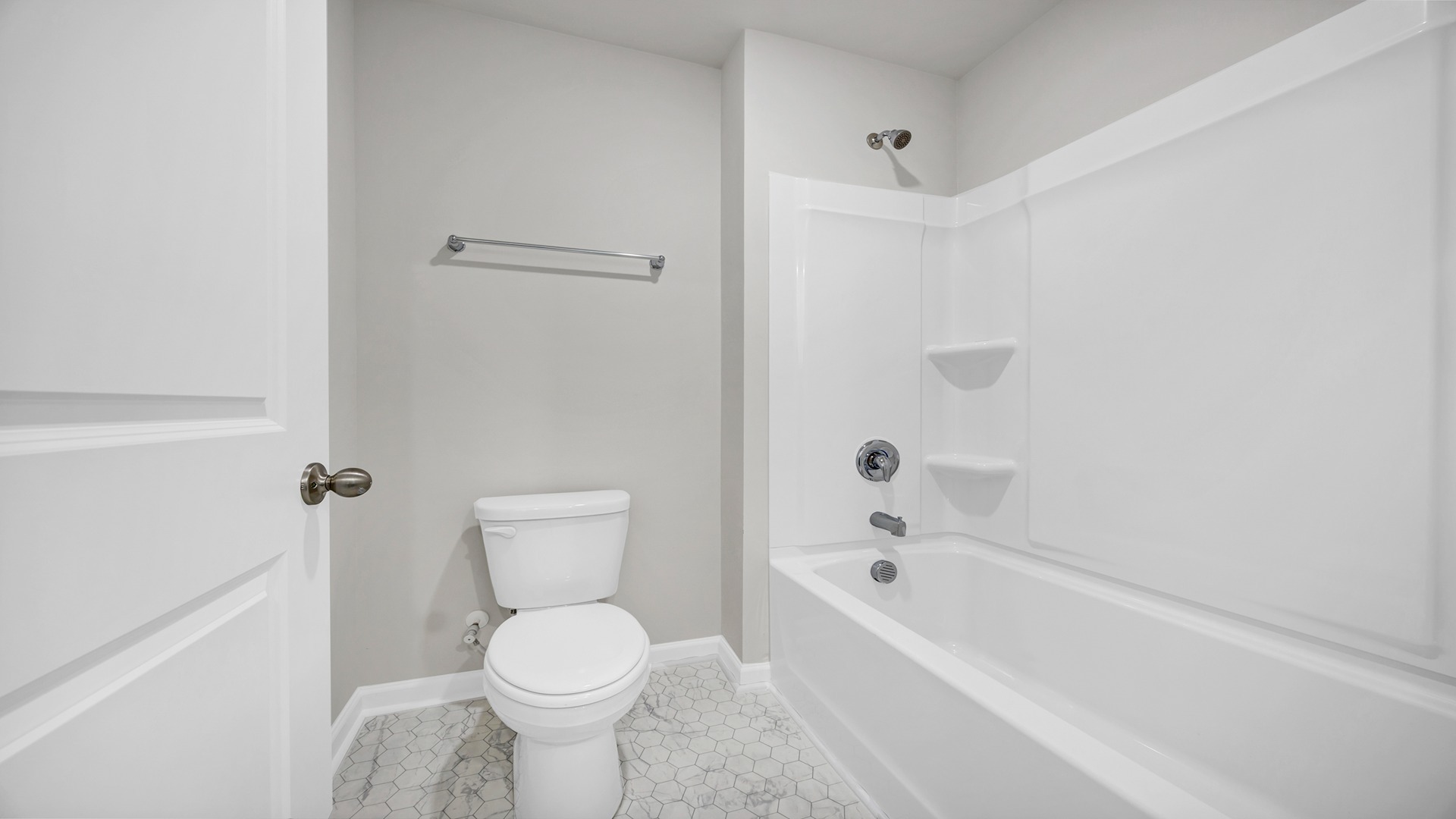 The full bathroom is located between bedroom 3 and 4 upstairs with a separate room with the shower and toilet
