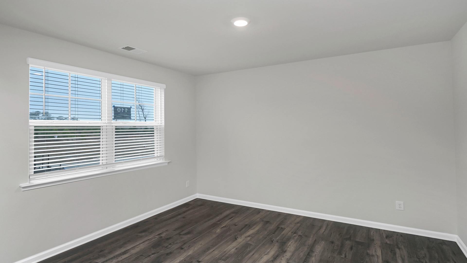 Revwood flooring in the front flex space of the Elle floorplan