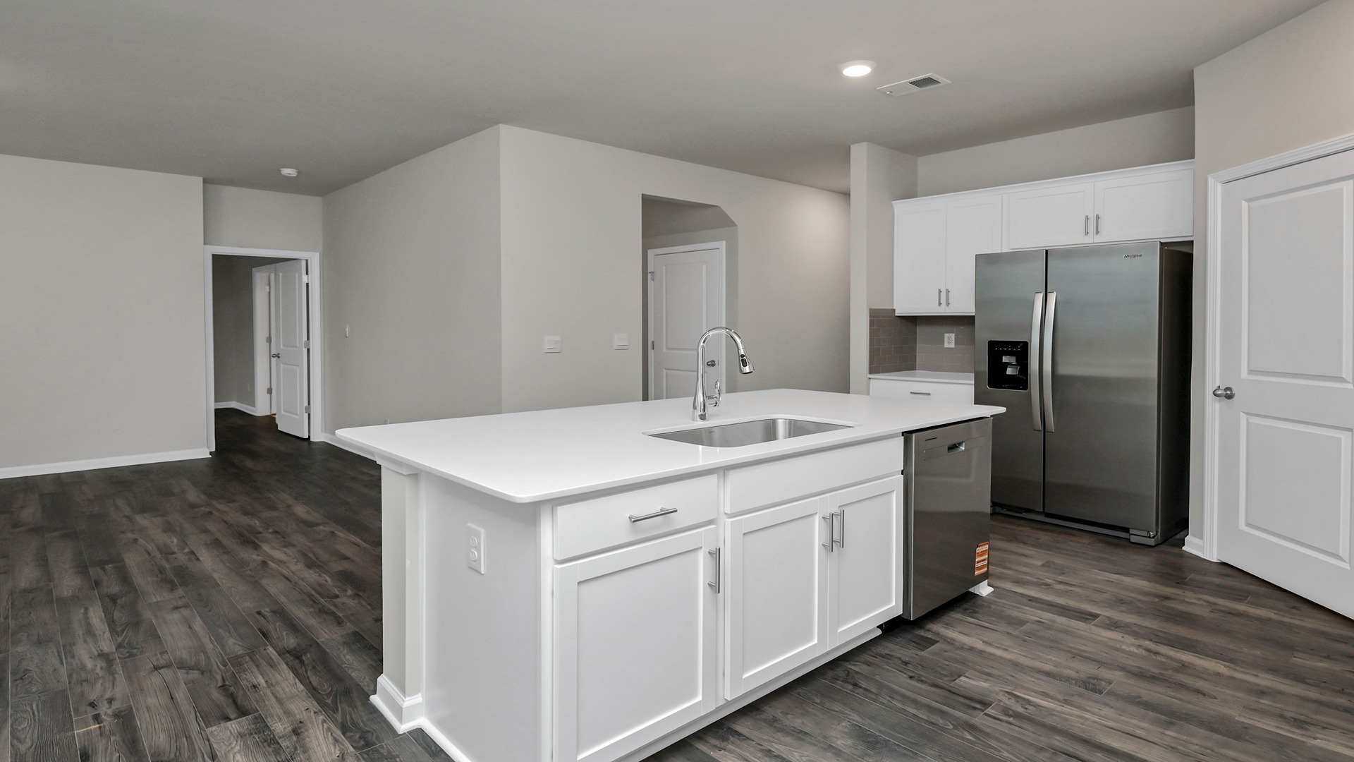 Floating kitchen island in the Elle overlooks the open living area