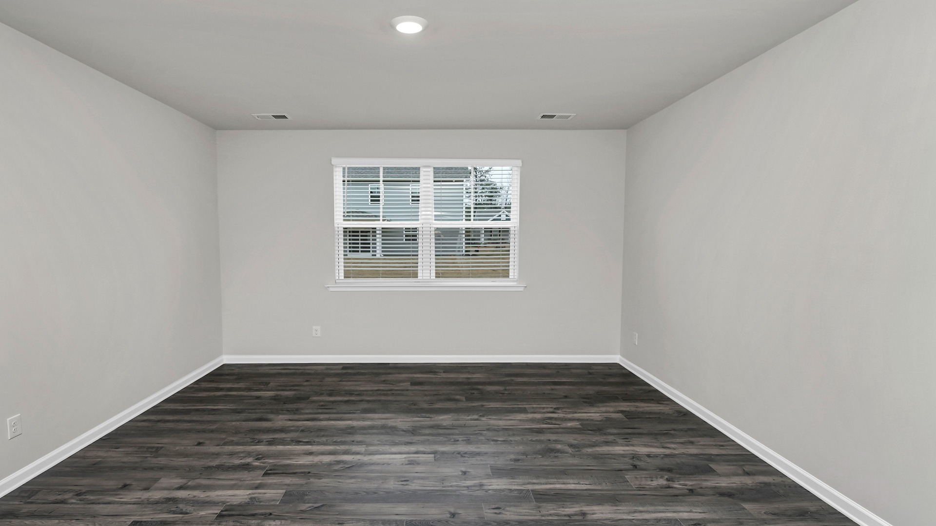 Downstairs primary bedroom in the Elle floorplan