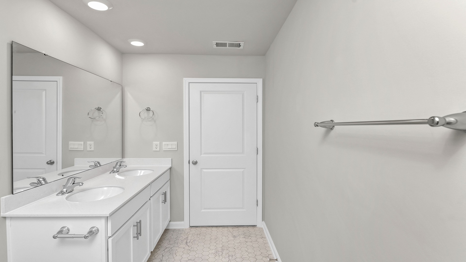 Bathroom 2 upstairs with a double vanity and shower tub combo