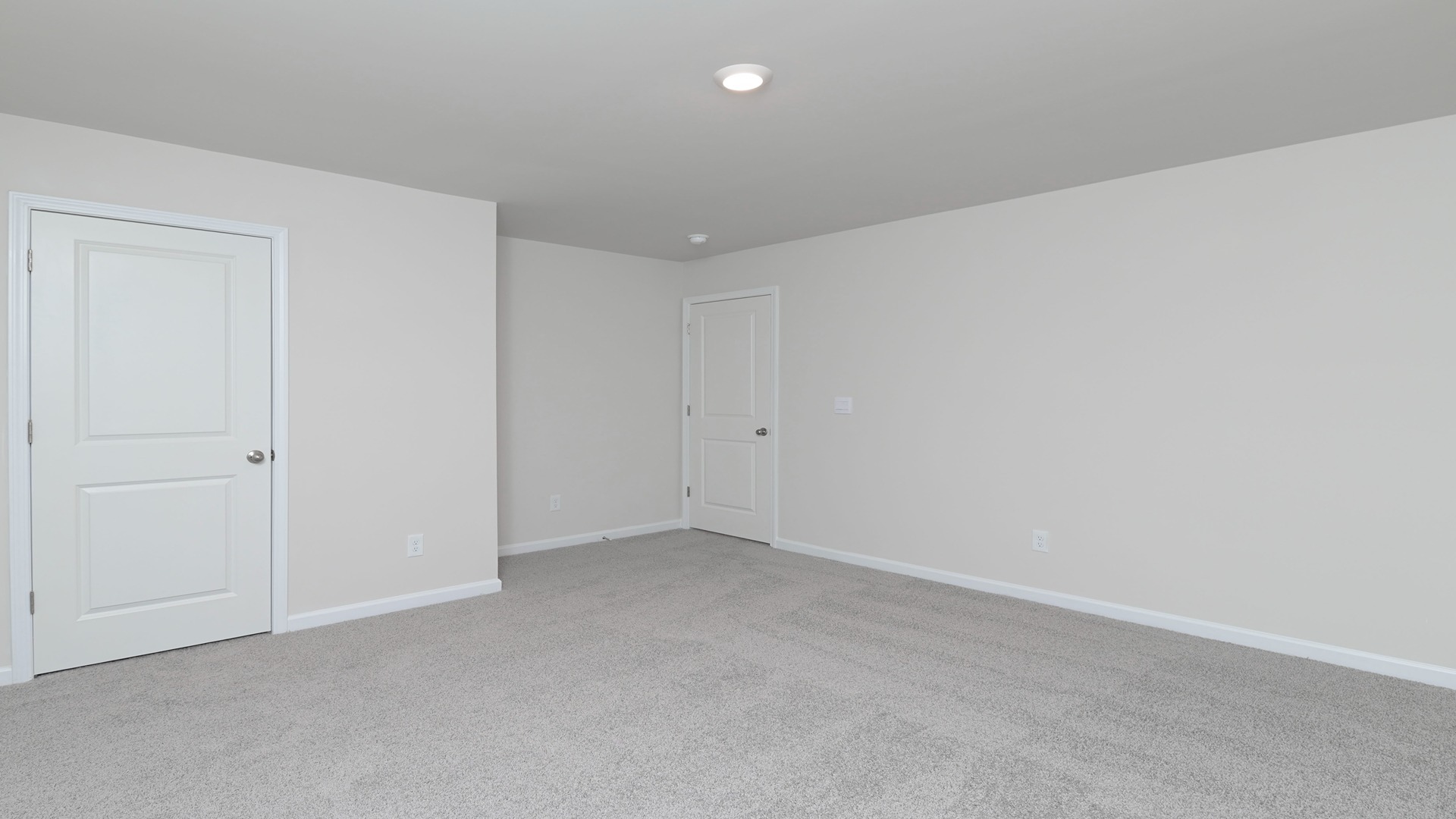 Bedroom 5 upstairs with carpet flooring and private closet