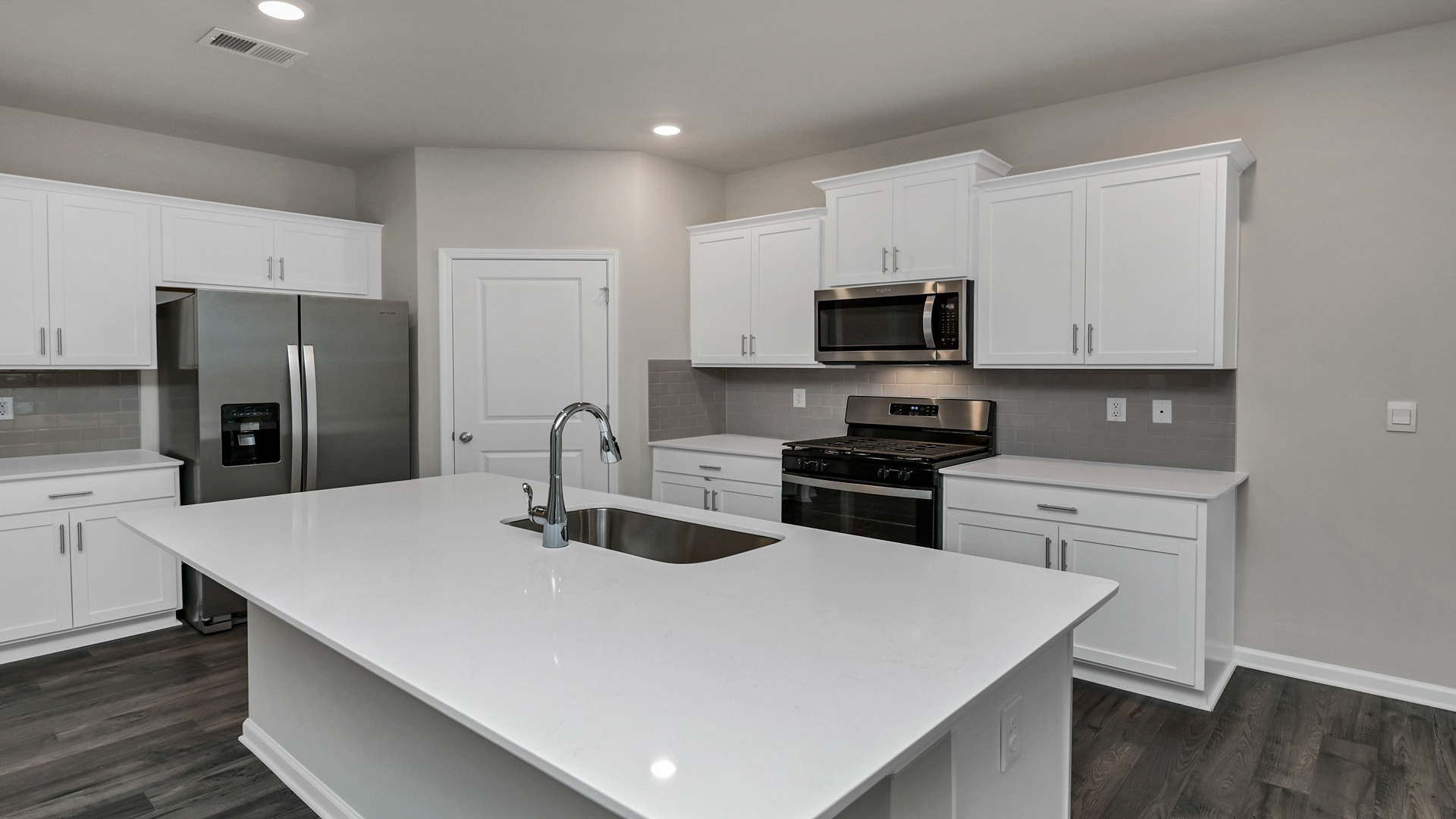 Tile backsplash in kitchen