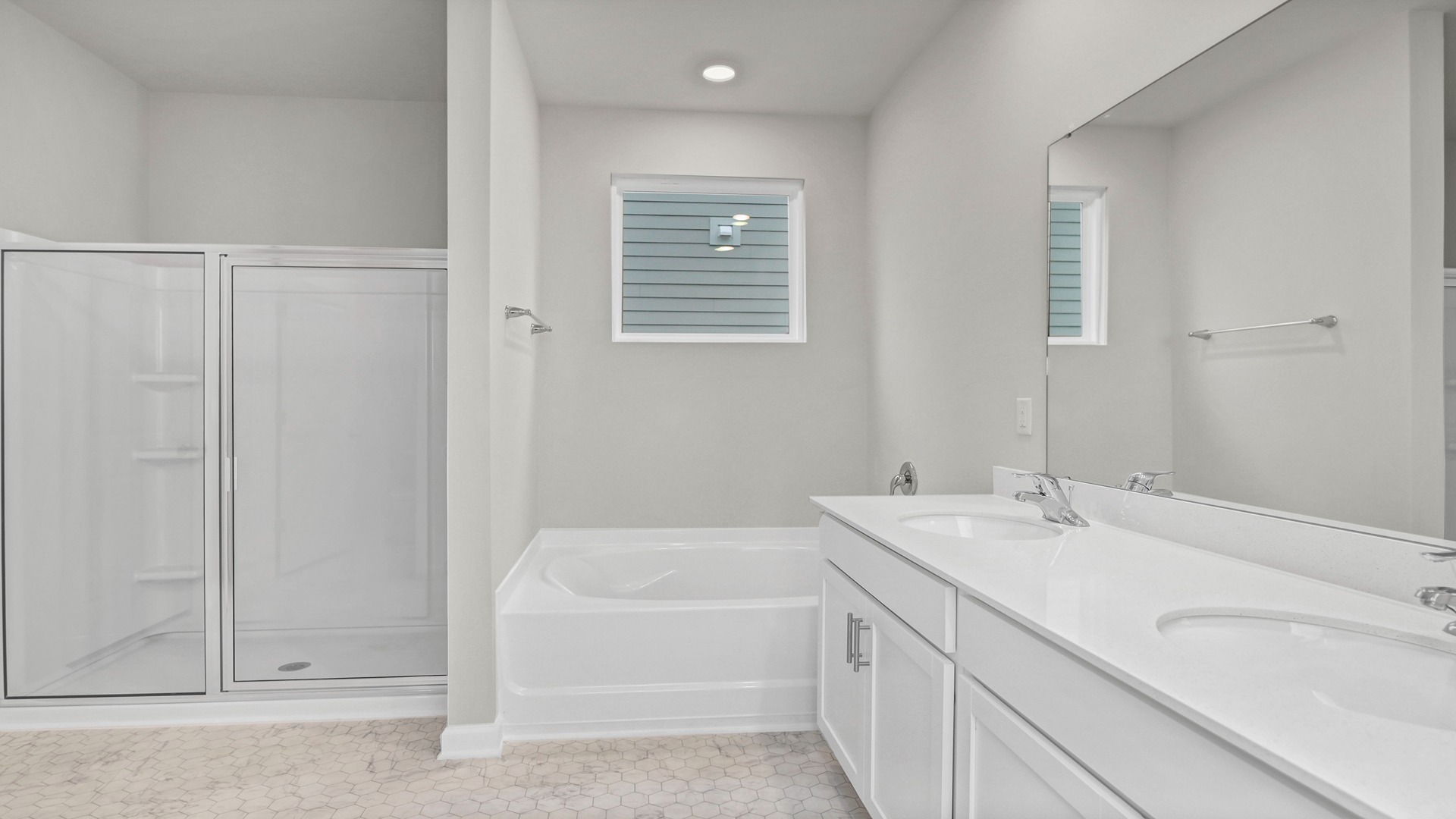 Primary bathroom with a standup shower and garden tub