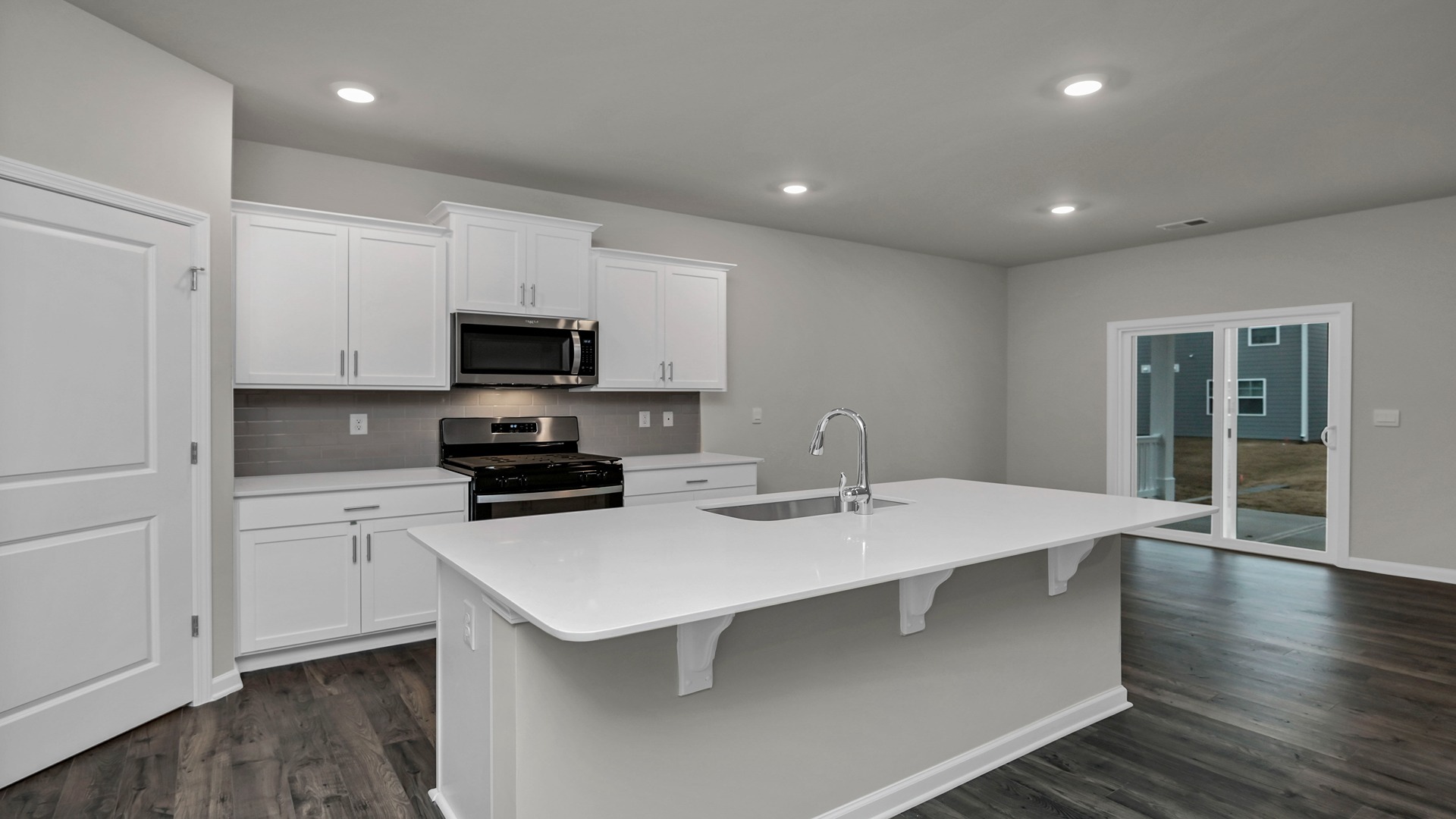 Front foyer opens up to the kitchen area