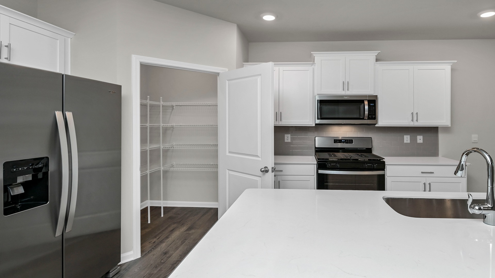 Spacious corner pantry in the kitchen