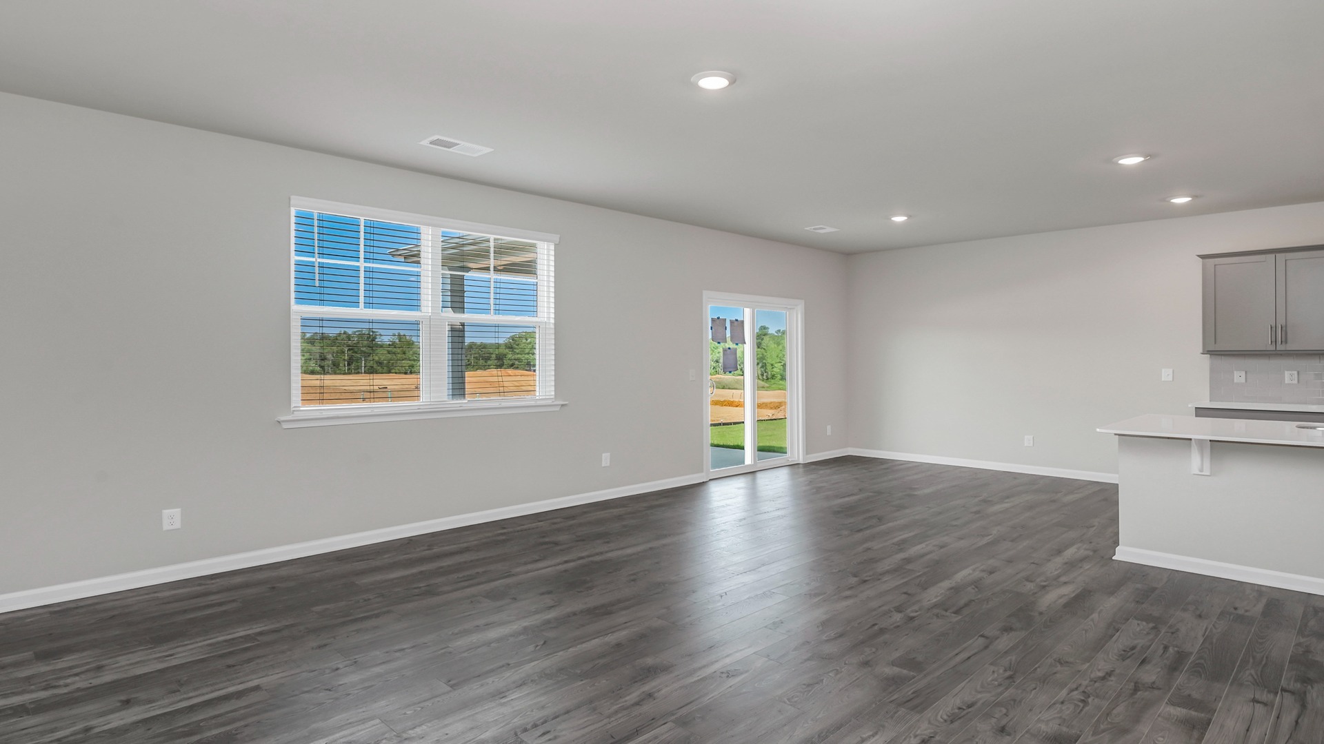 Luxury RevWood floors in main living areas of the Elle floor plan for sale