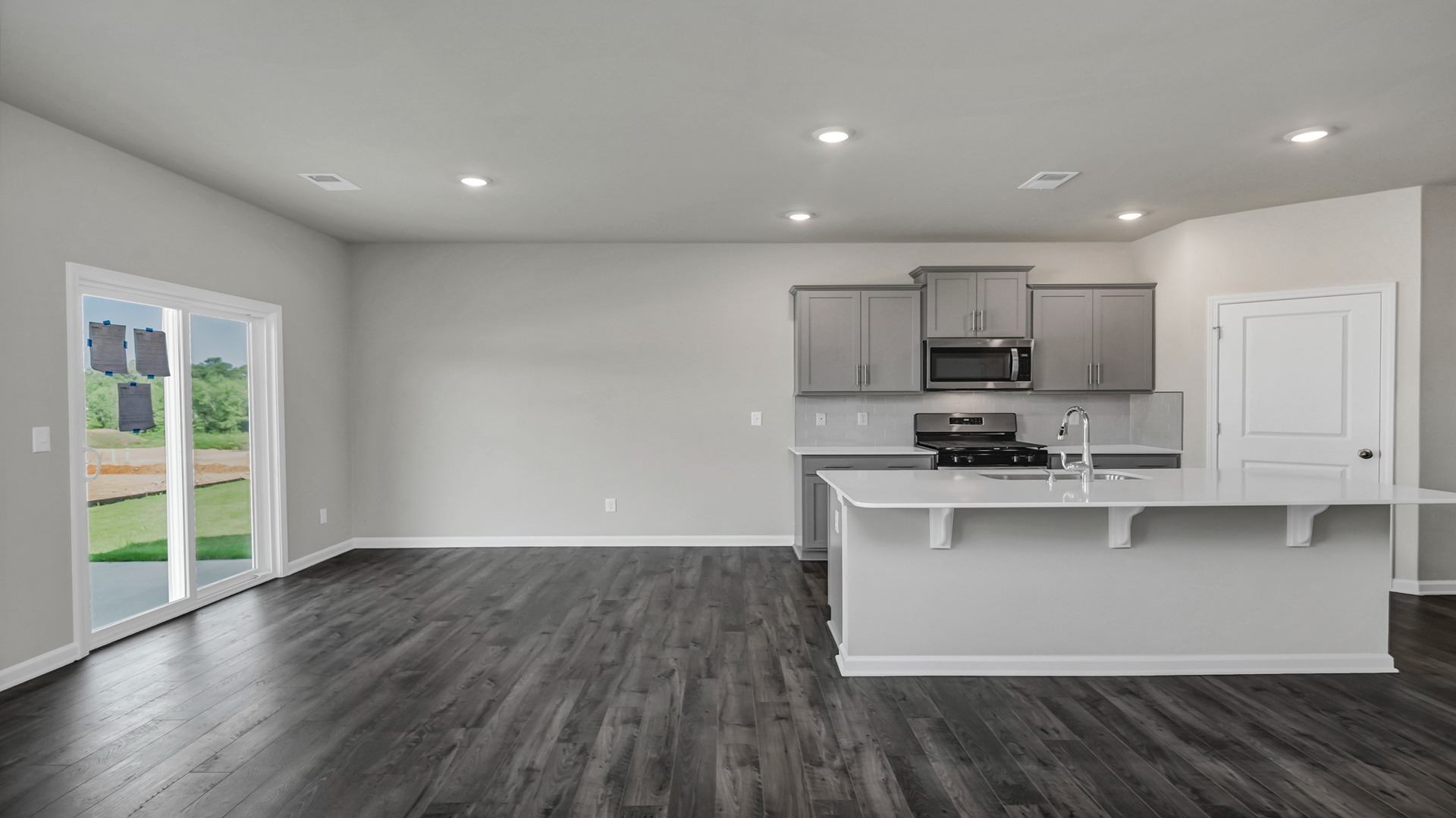 Open concept dining and kitchen areas in new construction home for sale in Blythewood, SC