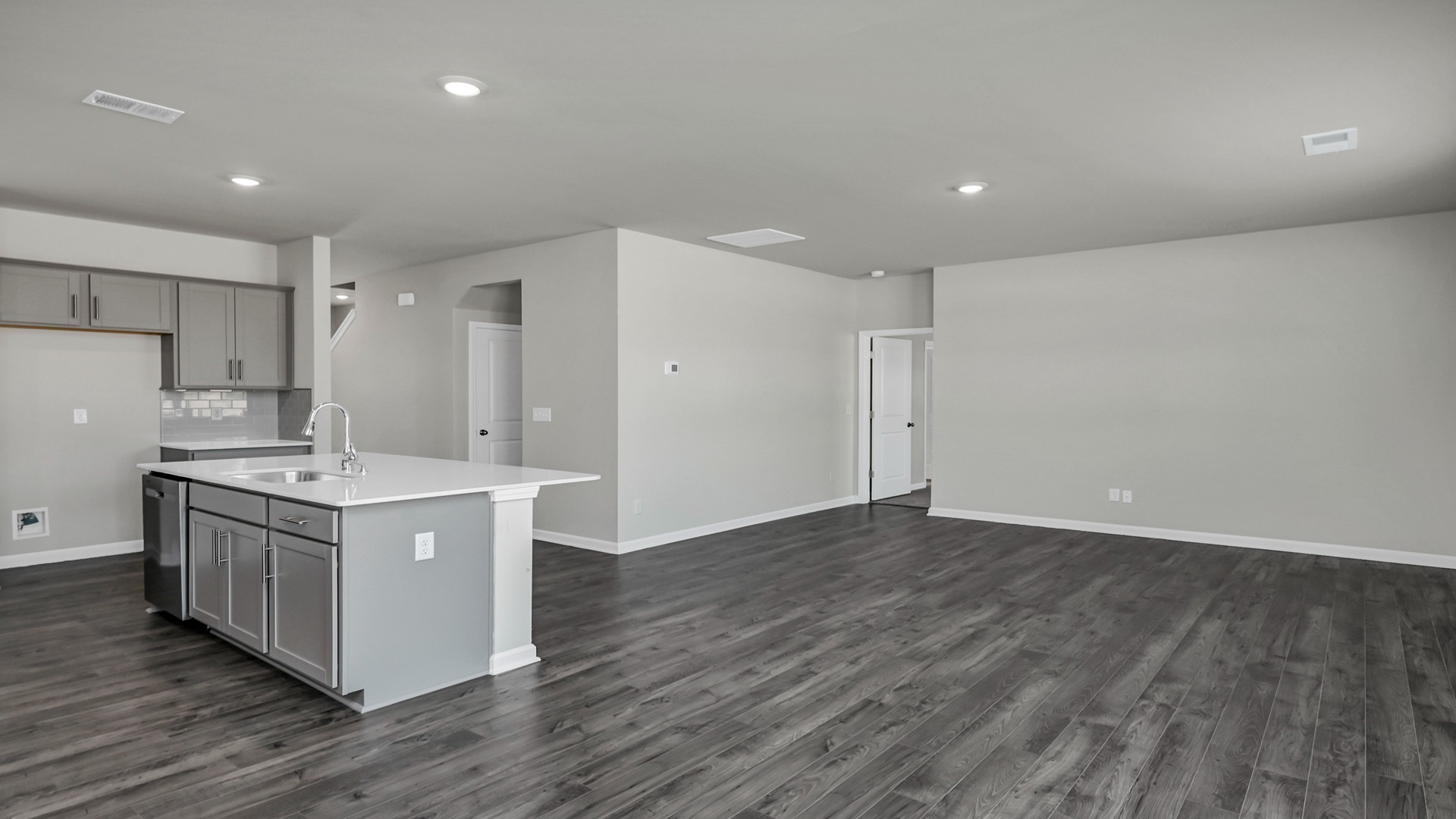 Open concept kitchen, dining and living areas in the Elle floor plan for sale in Blythewood, SC