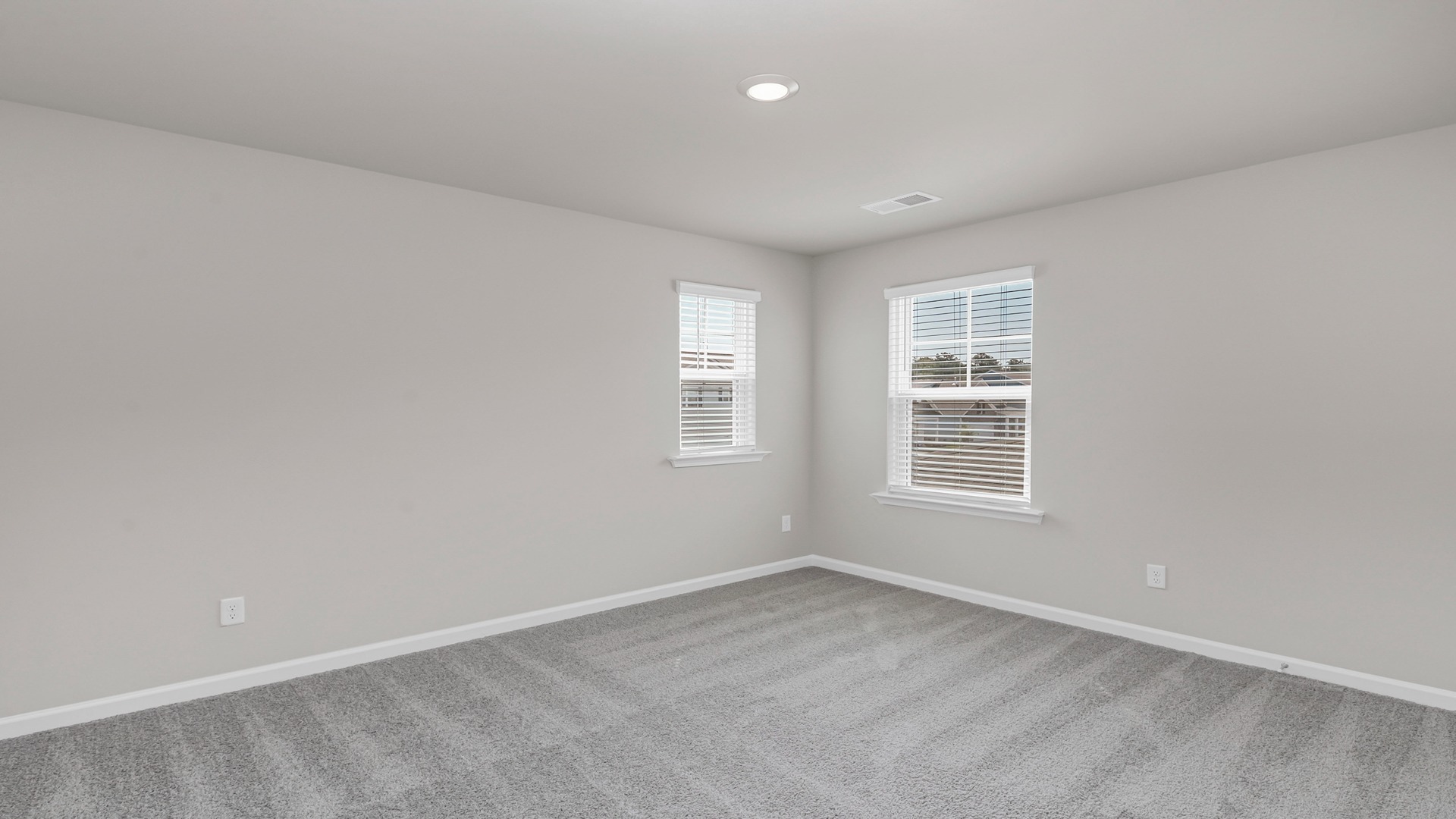 Bedroom 2 upstairs in the two-story Elle floorplan in Leatherstone