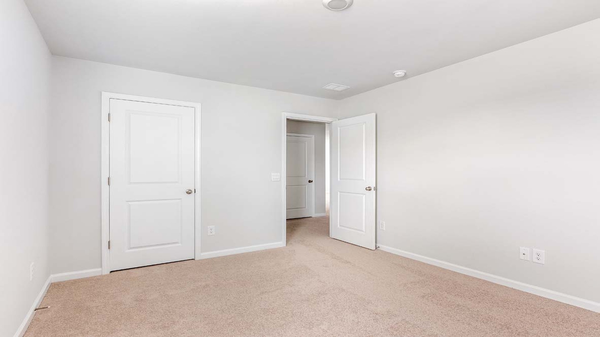 Bedroom 4 is also upstairs with carpet flooring and a window.