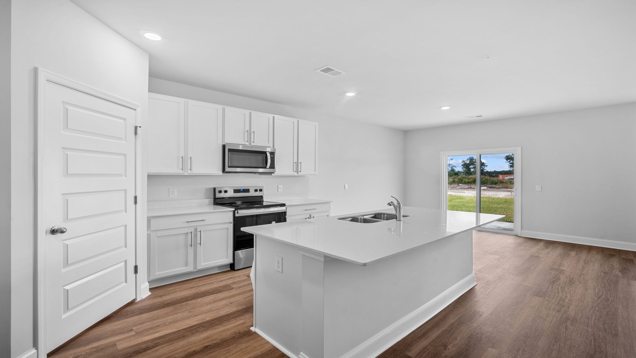 Elle Kitchen with white cabinetry and white quartz countertops