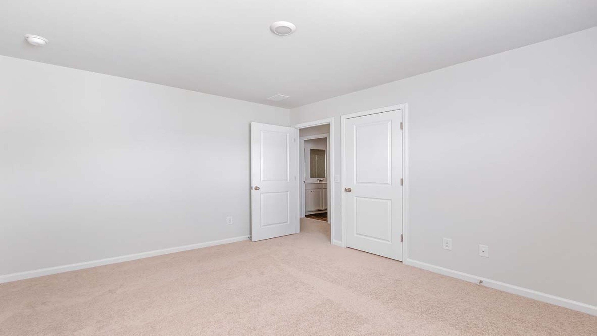 Bedroom 3 upstairs with carpet flooring and a window.