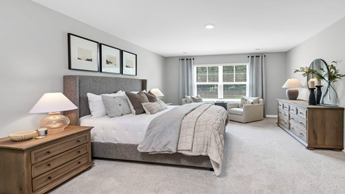 The Primary bedroom is carpeted and located upstairs.