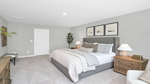 The Primary bedroom is carpeted and located upstairs.