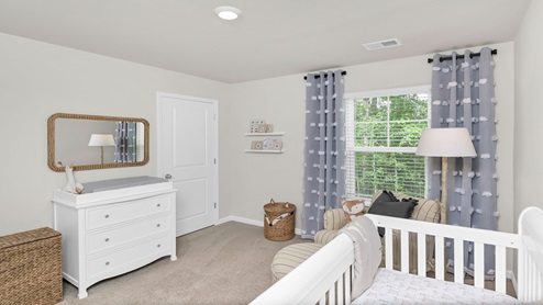 Bedroom 3 is carpeted and located upstairs.