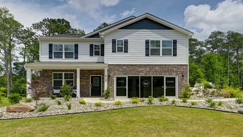Leatherstone Hayden Model home with brick accent