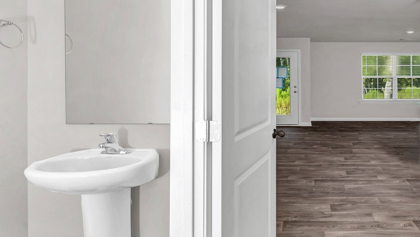 First-floor powder room off the front foyer in the Pearson