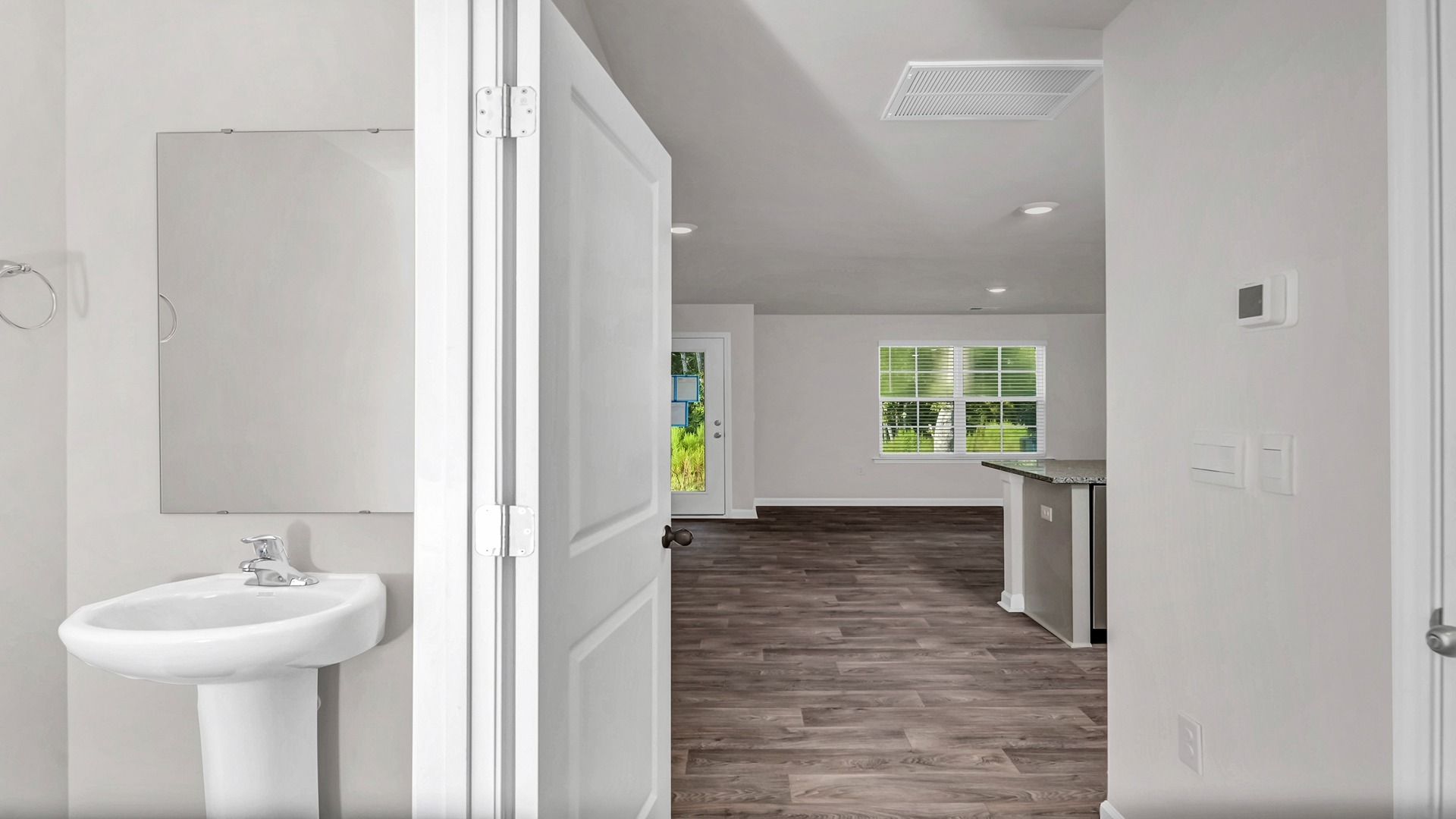 Front foyer with a powder room/half bathroom