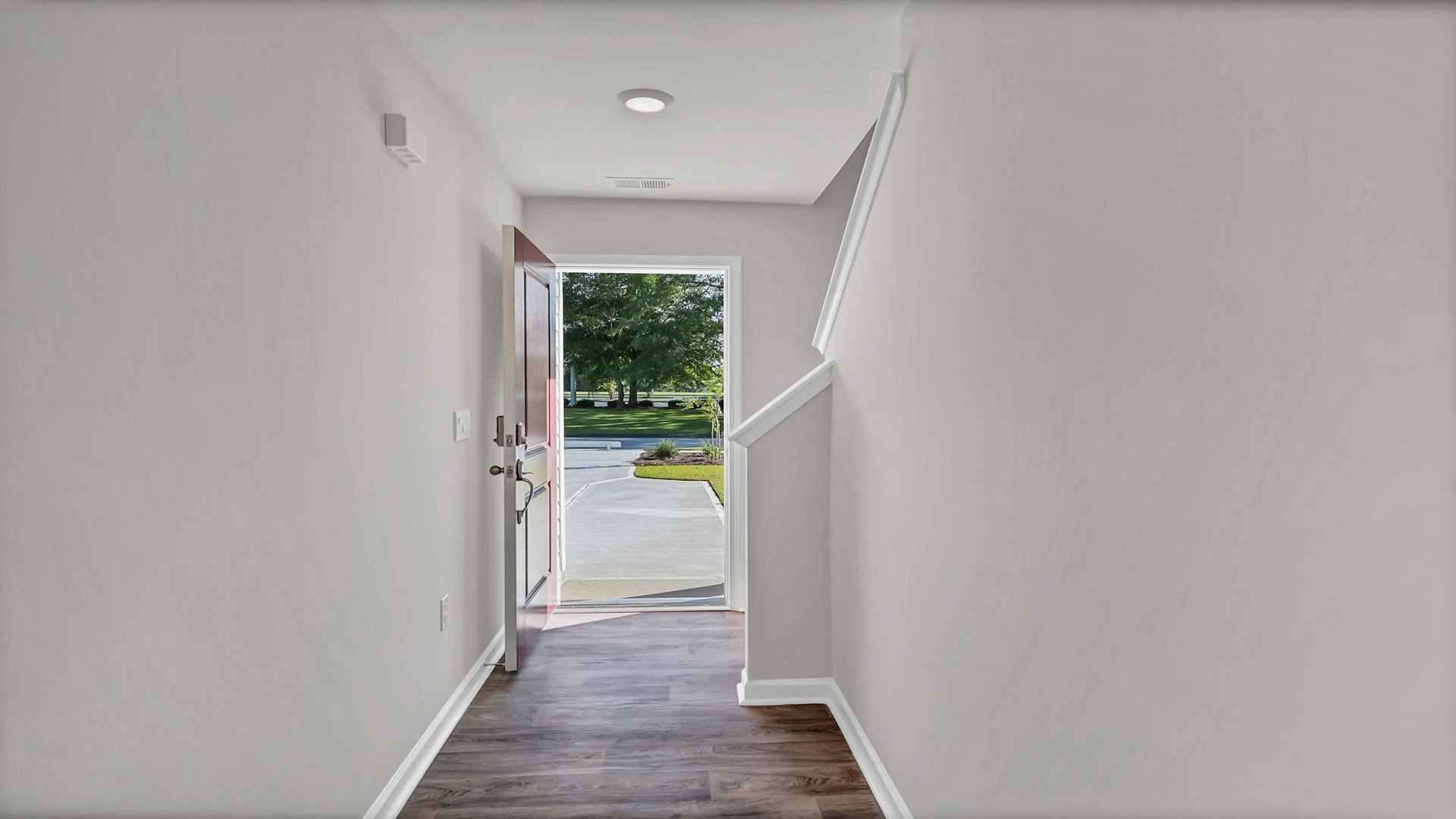 Front foyer leads from the front door into the open first floor