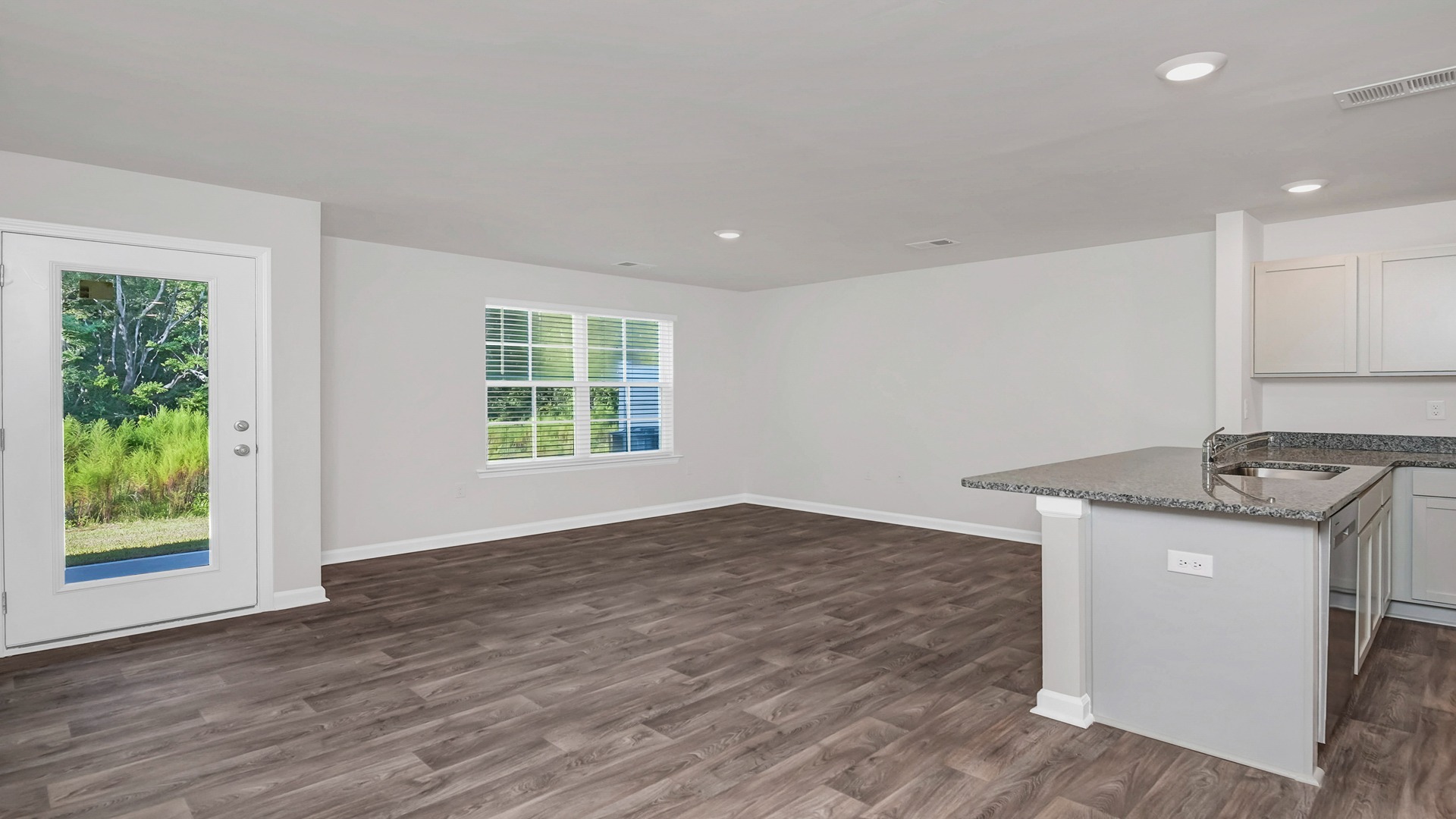 Vinyl floors and natural light througout