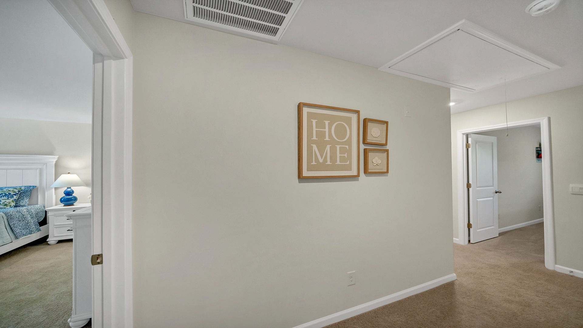 Upstairs hallway connecting all bedrooms and bathroom