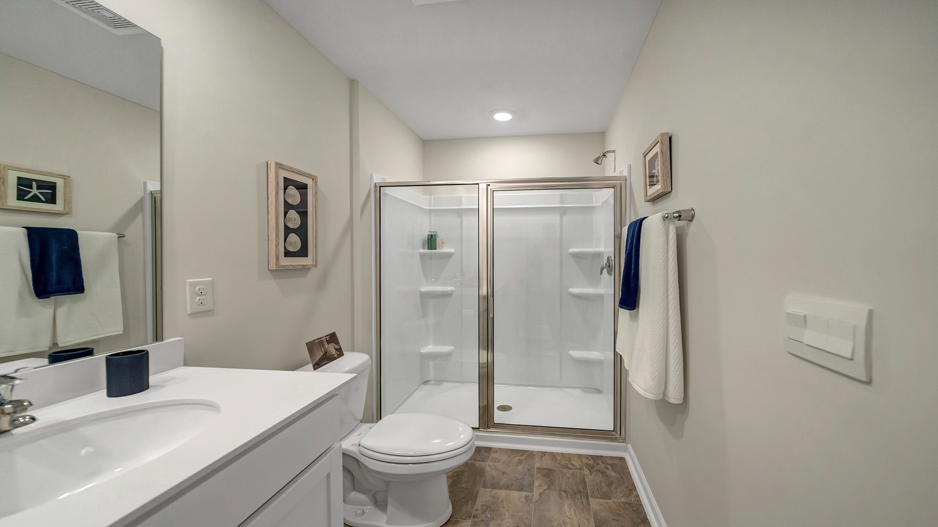En-suite primary bathroom with standup primary shower